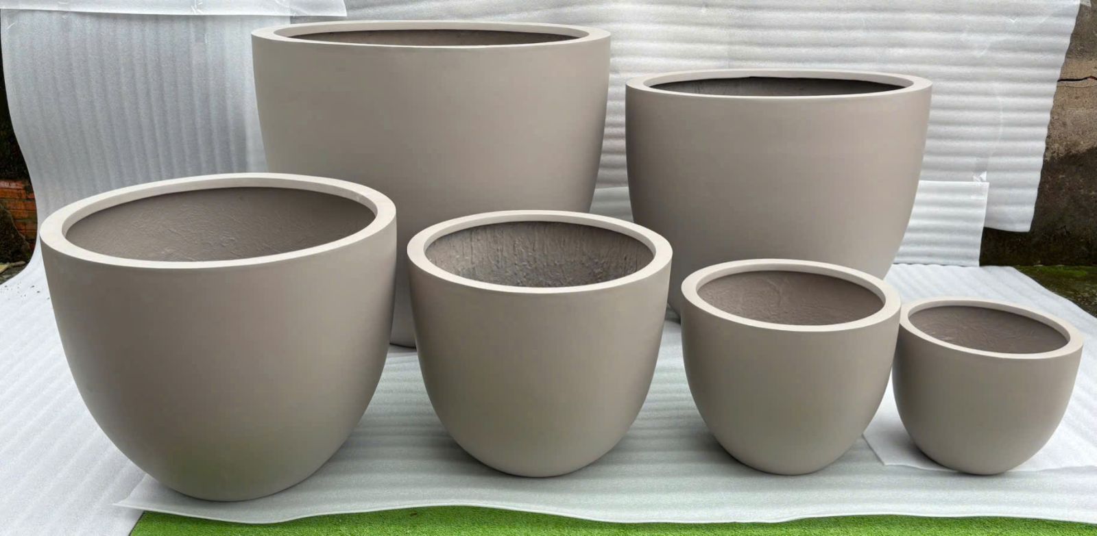 Chậu composite nuôi cá hình chảo tại chậu cây xanh sài gòn
